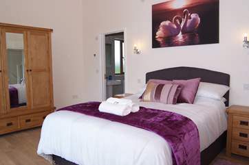 The room is exceptionally light and has a stunning high ceiling.