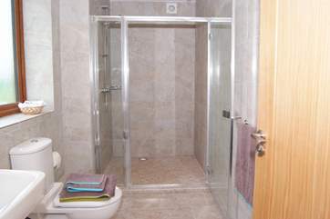 The main bedroom has a really large walk-in shower in its en suite shower-room.