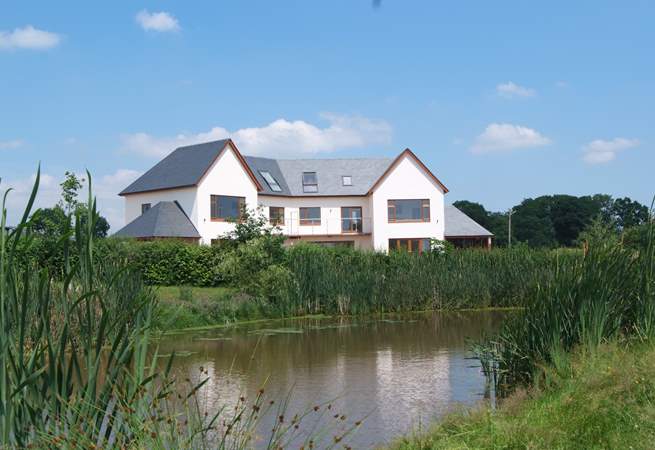 Lakeside House is to the right of these stunning holiday properties. Each has its own fully enclosed garden, privacy glass for the patios and fencing.