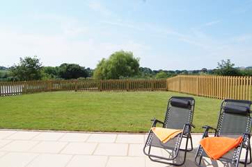 This is your fully enclosed garden. A little child proof gate opens onto a path to the the lake.