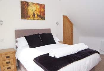 This double bedrom is on the second floor. It has a wonderful retractable balcony with amazing views.