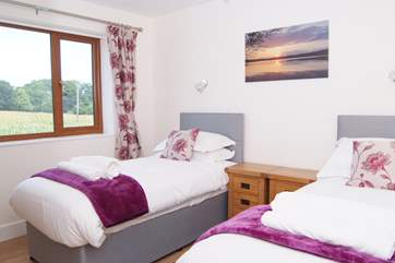 The twin bedroom is also on the first floor, as is the family bathroom which has a bath and a shower.