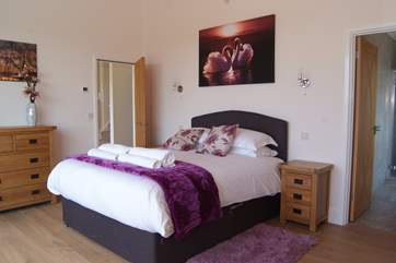The master bedroom has its own en suite facilities.
