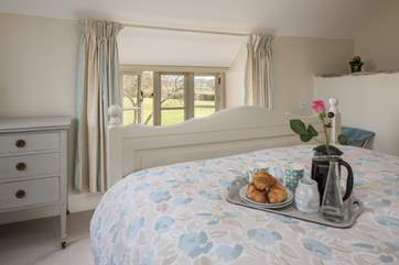You can lie in bed and look across the surrounding fields.