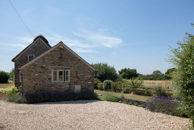 The very private south-facing garden is behind the cottage, surrounded by farmland and a network of footpaths and bridleways.