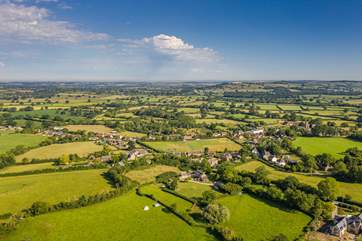 What a beautiful setting. Pound Farm Cottage is the first house up from the bottom of the photograph, in the centre, with the owner's house next door.