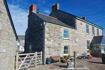 Welcome to Sunsets (over Rinsey), the annexe is on the left-hand side of the family home.