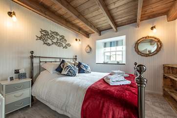 The bedroom on the ground floor.