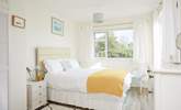 Wake up in a generous king-size bed admiring the wonderful sea views and surrounding greenery. - Thumbnail Image