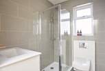 The principal bedroom has a modern en suite shower-room.