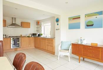 The open plan kitchen/dining-room is a fabulous, large, light space for entertaining while preparing meals.