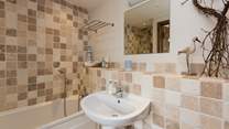 As well as en suite facilities upstairs there is a ground floor bathroom too.