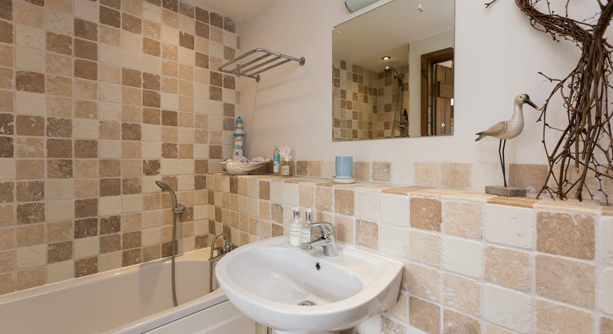 As well as en suite facilities upstairs there is a ground floor bathroom too.