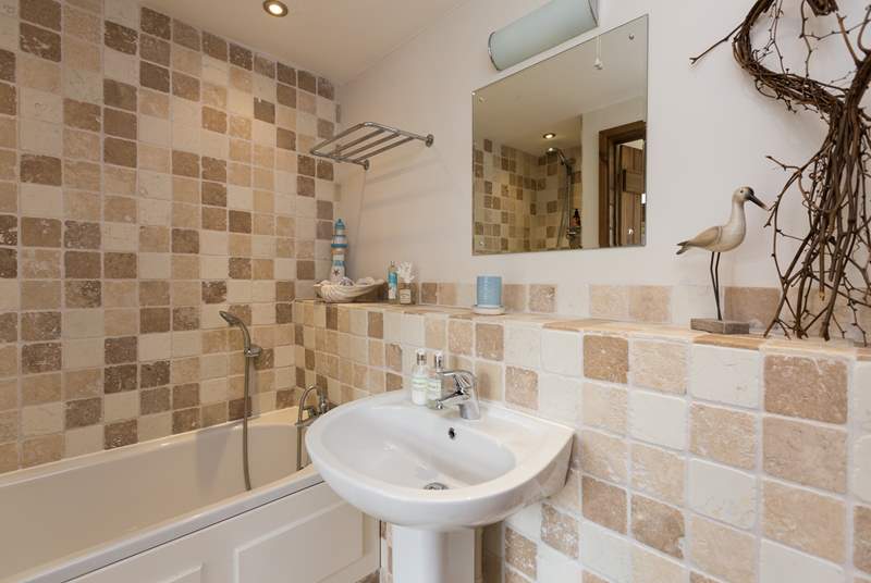 As well as en suite facilities upstairs there is a ground floor bathroom too.