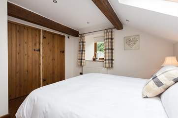 The high ceilings and beam add character to this top quality barn conversion.
