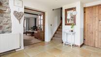 The large entrance hall. There is a handy downstairs WC just off this room.