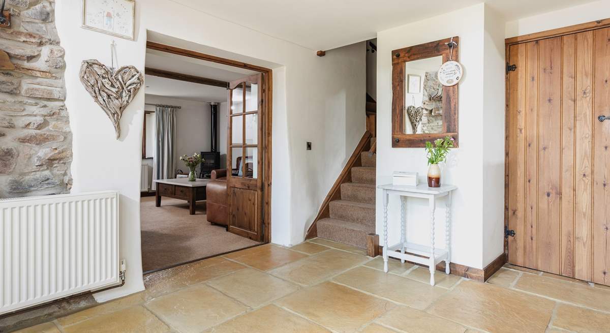 The entrance hall links the barn together benefitting from a downstairs WC.