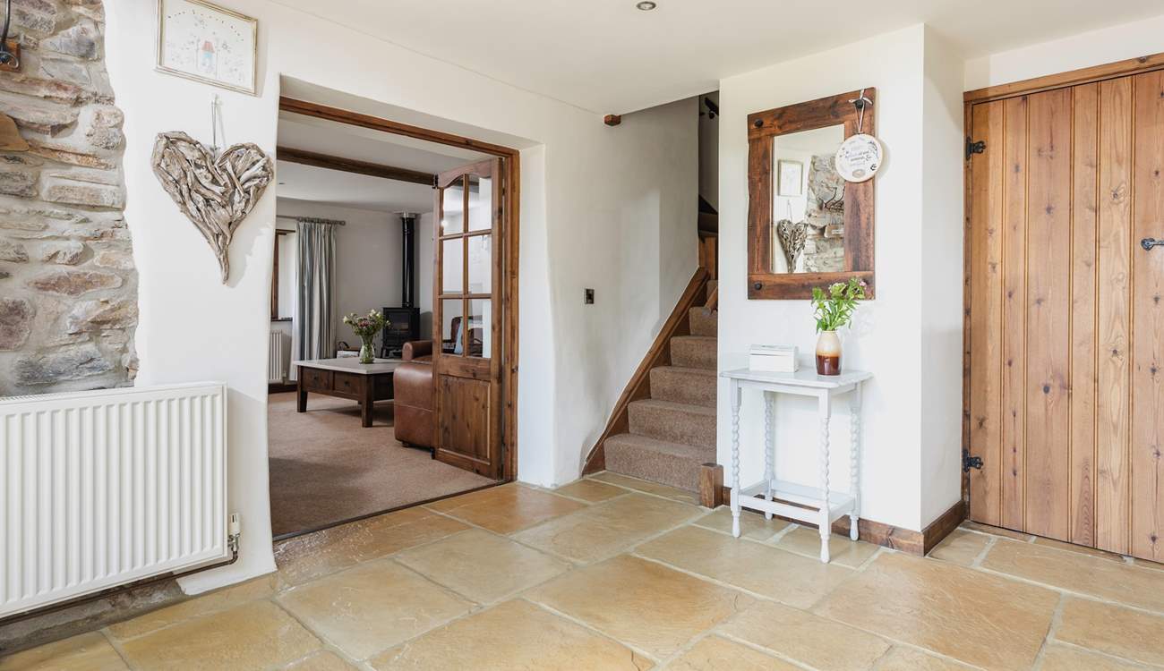 The large entrance hall. There is a handy downstairs WC just off this room.