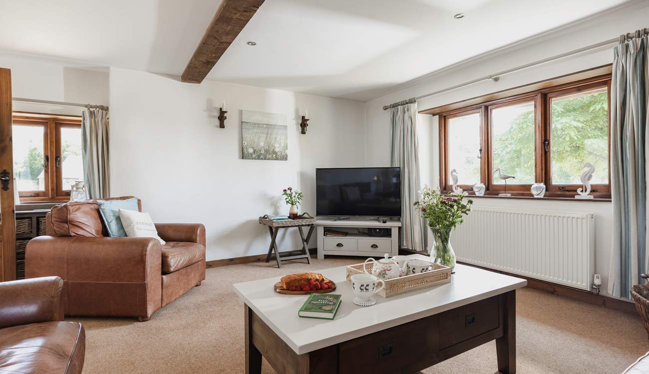 The room is double aspect and floods with light.