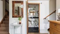 The downstairs WC is next to this step up into the kitchen/diner.