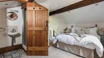 This is the second double bedroom. This bedroom has an en suite shower, WC and wash-basin.