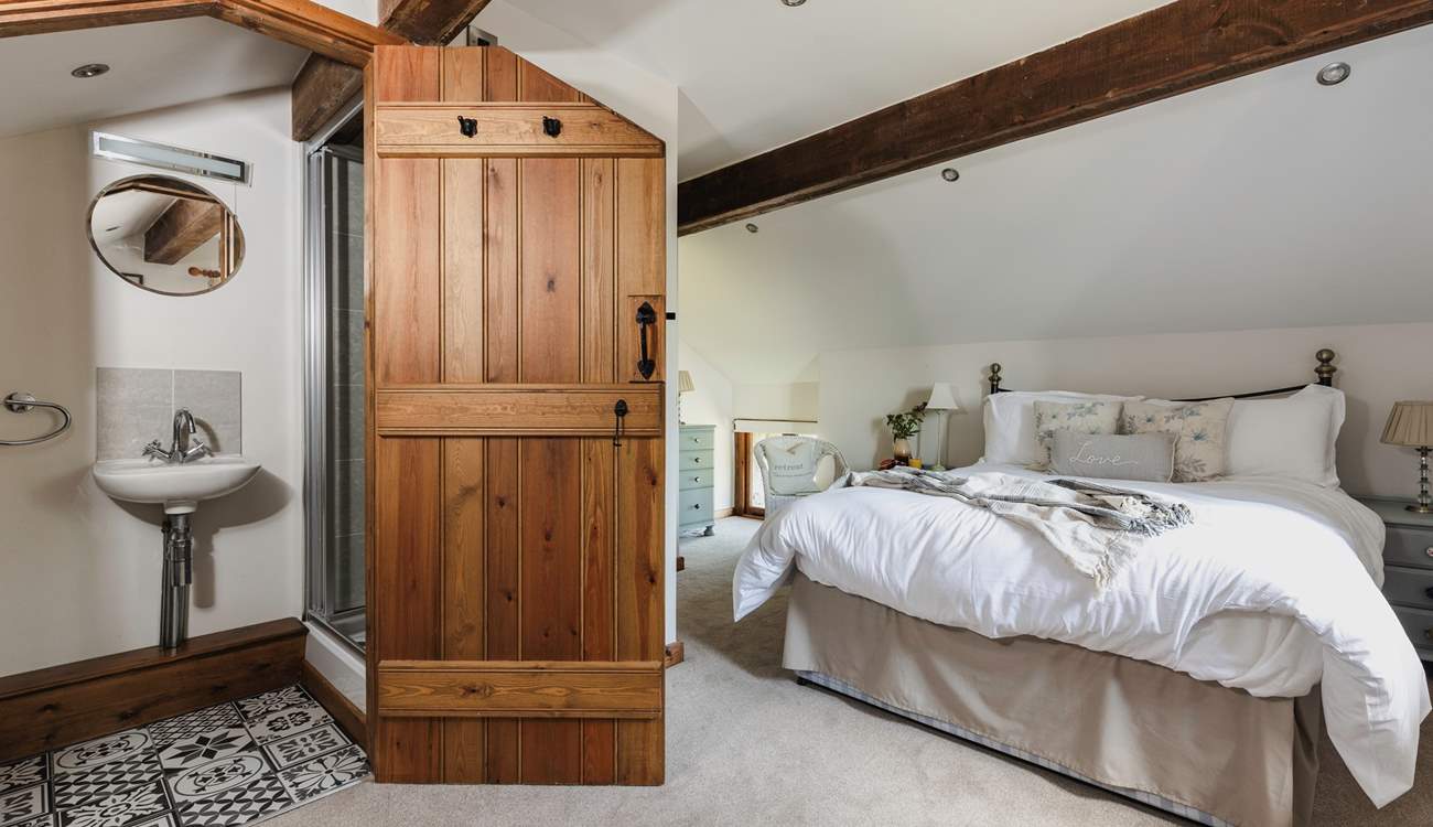 This is the second double bedroom. This bedroom has an en suite shower, WC and wash-basin.