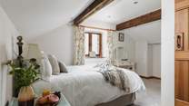 Bedroom 2 awaits your arrival.