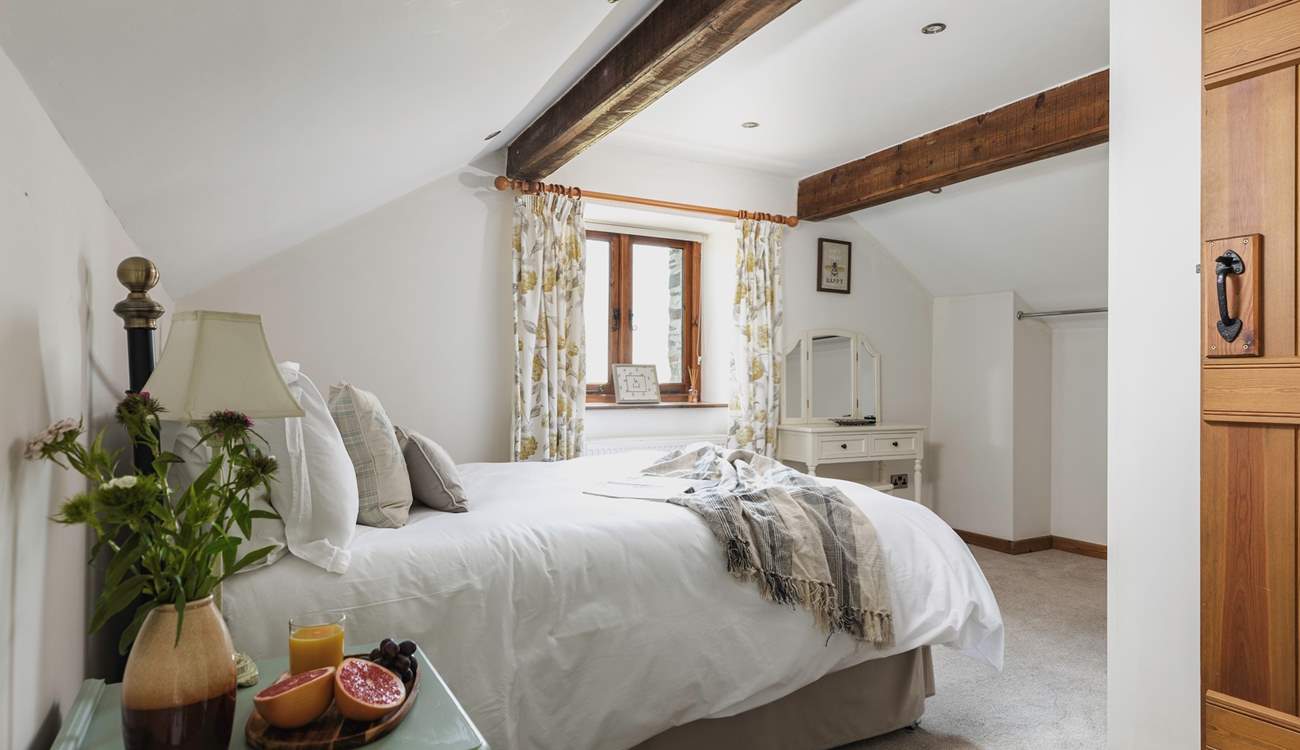 Bedroom 2 awaits your arrival.