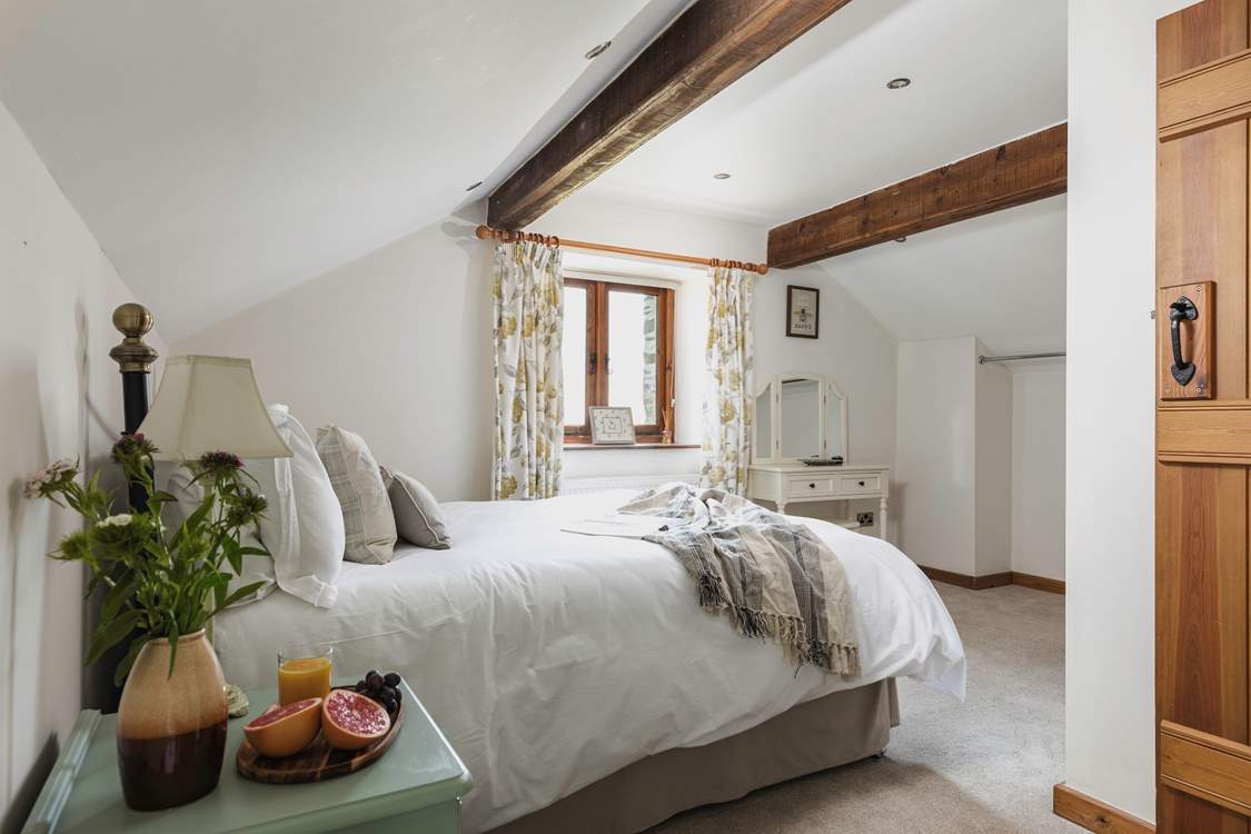 Bedroom 2 awaits your arrival.