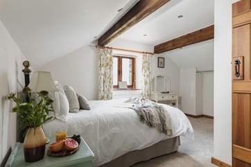 Bedroom 2 awaits your arrival.