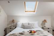 The high ceilings and beams add character to this top quality barn conversion.