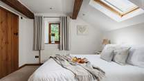 This is one of the two double bedrooms. This bedroom has an en suite WC and wash-basin.
