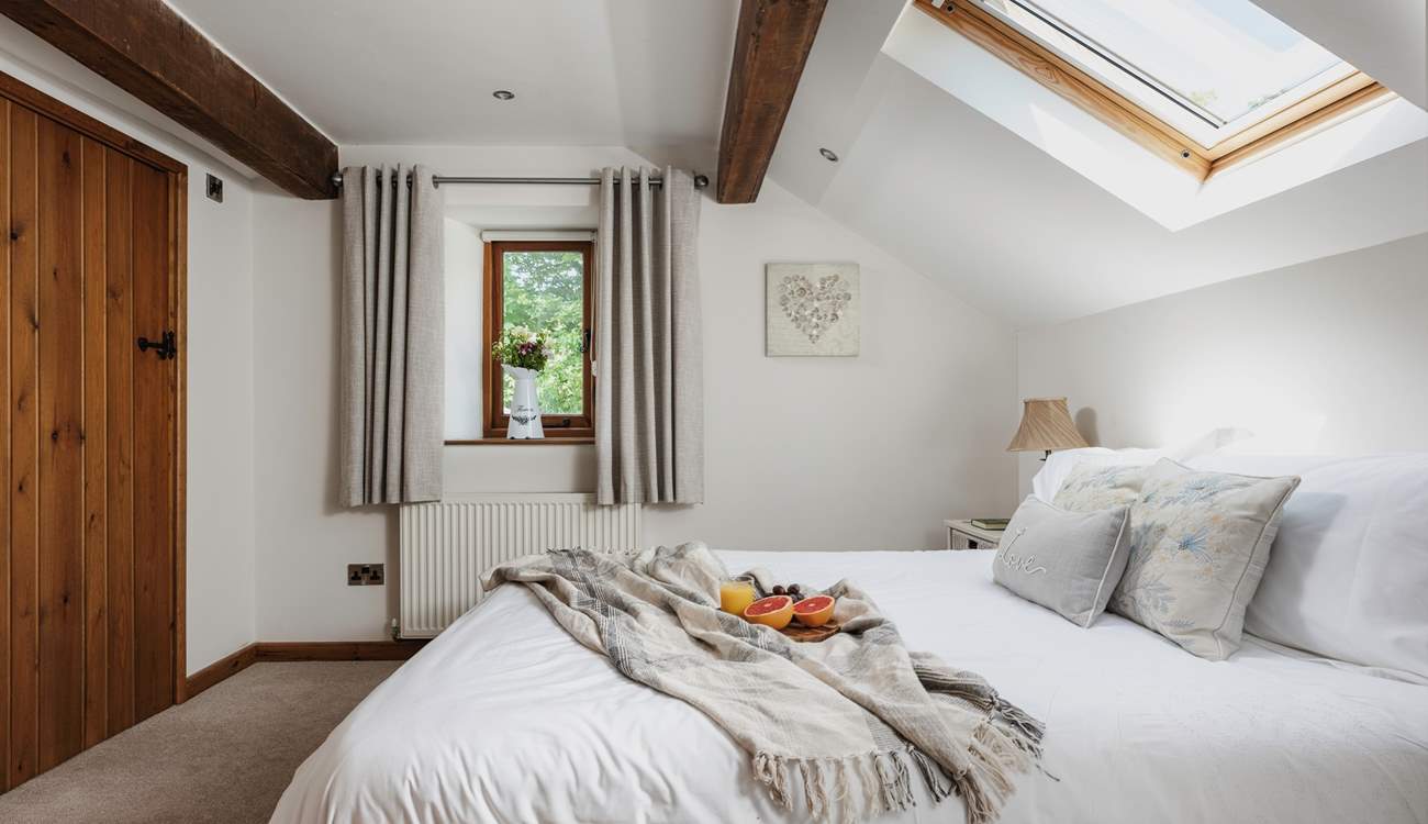 This is one of the two double bedrooms. This bedroom has an en suite WC and wash-basin.