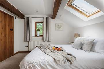 This is one of the two double bedrooms. This bedroom has an en suite WC and wash-basin.