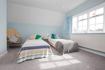The twin bedroom has plenty of space for the children to play while making lots of happy memories.