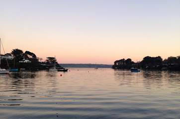 Relax at The Pandora Inn with a drink on the pontoon.