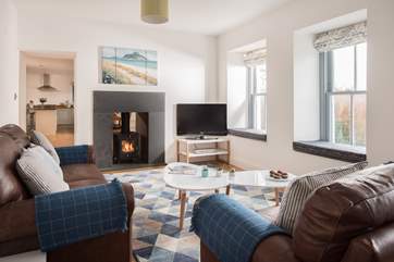 The dual aspect wood-burner can be enjoyed throughout the property.