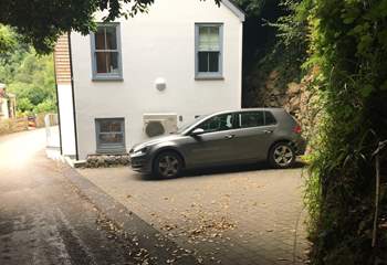The parking space next to the house for two medium cars can be parked in parallel  to the road or to the house.