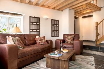 Plenty of room to unwind and relax in the sitting-room.