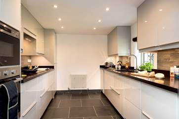 The sleek and stylish kitchen.