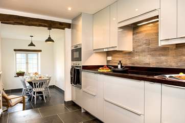 Two steps lead down from the kitchen to the dining area.