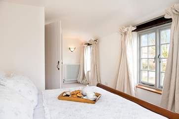 The double bedroom has a super-comfy bed which is adorned with lovely linens.