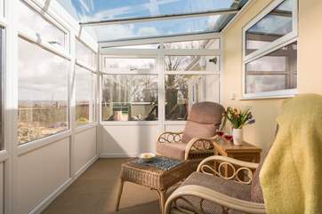 You are sure to spend many an hour in the conservatory planning the day ahead or simply taking in the view.