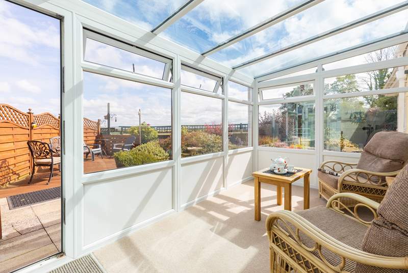 You are sure to spend many an hour in the conservatory planning the day ahead or simply taking in the view.