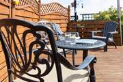 Enjoy a spot of al fresco dining in the outside seating area.