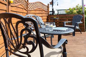 Enjoy a spot of al fresco dining in the outside seating area.