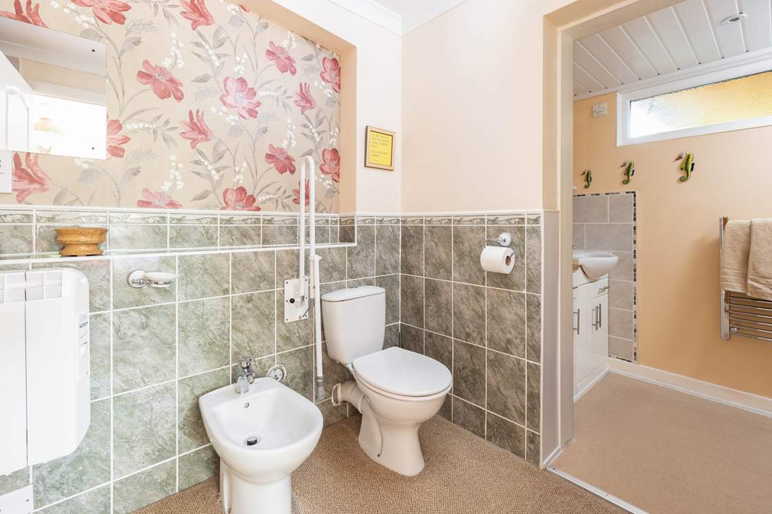 The en suite shower room leads off from the bedroom.