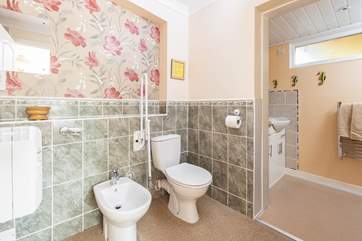 The en suite shower room leads off from the bedroom.