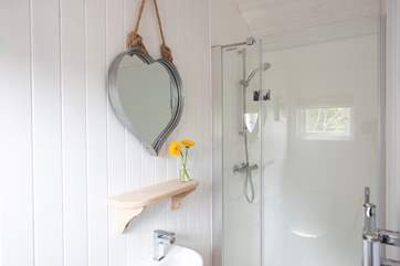 Of course, there is a spacious en suite shower-room complete with hot and cold running water and a proper flushing WC too.