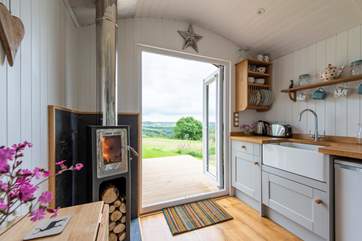 The pretty kitchen-area is fully equipped for your glamping holiday needs.